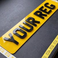 Yellow 4D rear number plate with raised gloss black letters