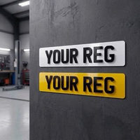 White front and yellow rear 4D number plates side by side