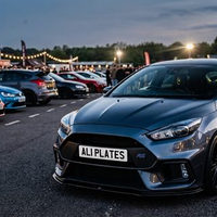 White 2D show plate reading Ali Plates fitted to a Ford Focus RS at a car meet