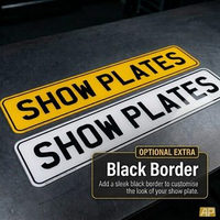 Yellow and white 2D show plates with the optional black border around the edge